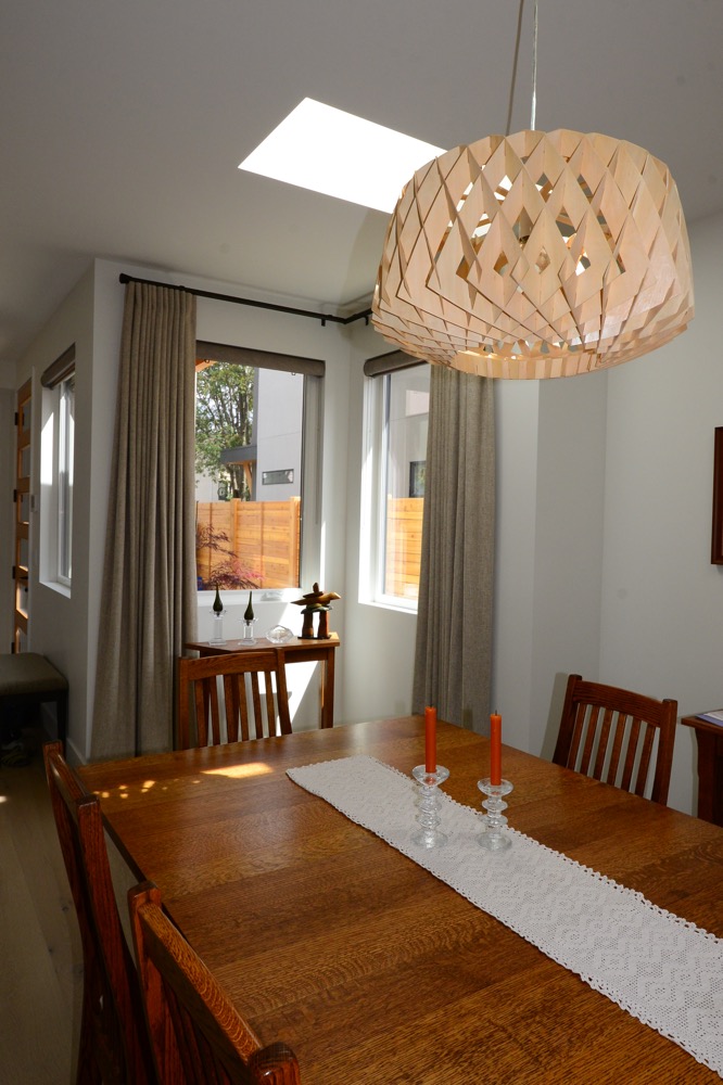 Custom drapes in corner window for contemporary Kelowna home