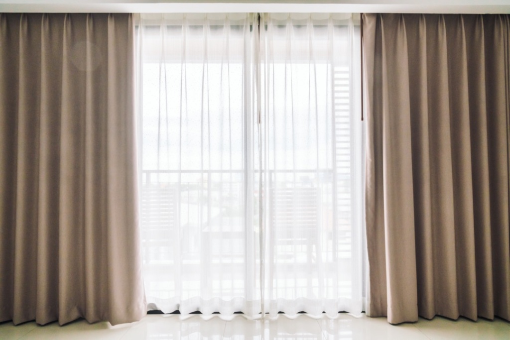 Curtains hanging in window